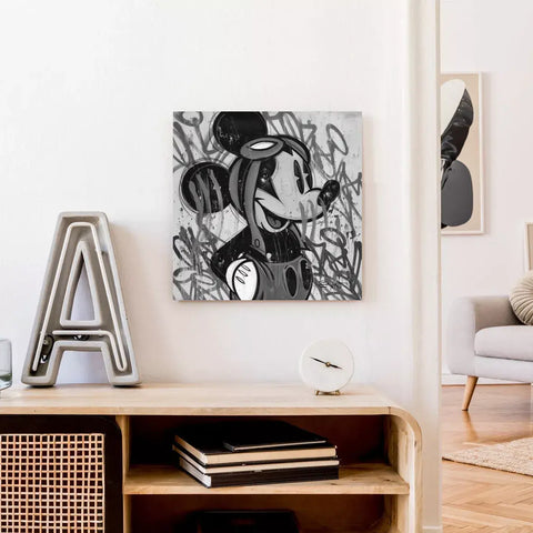 A black and white painting on a wall