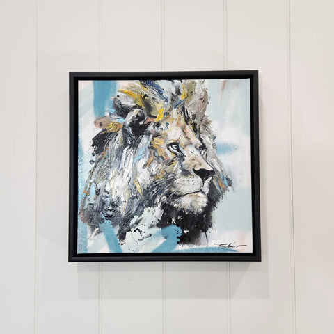 A painting of a lion on a wall