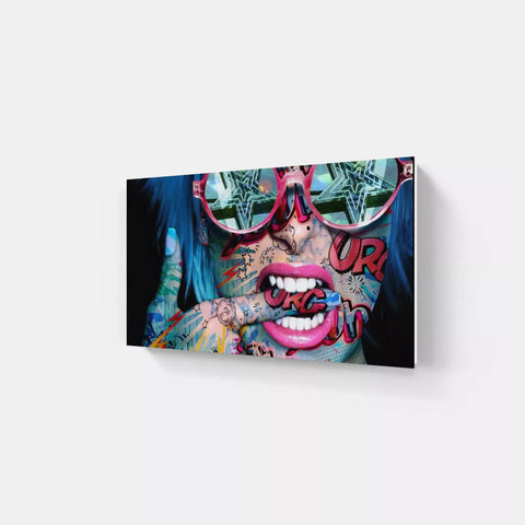 A woman with tattoos and pink lipstick on her face canvas print