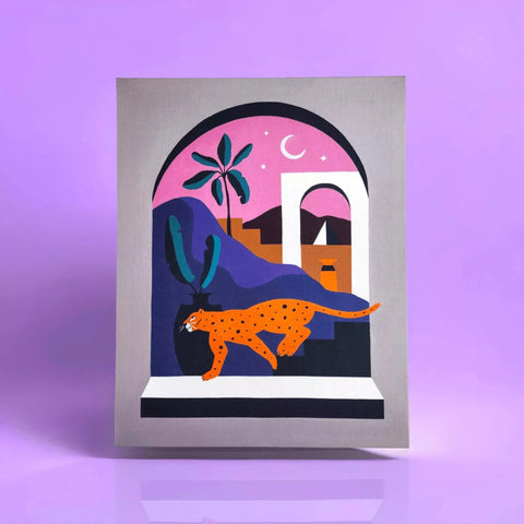 A card with a cat and a cat in the window