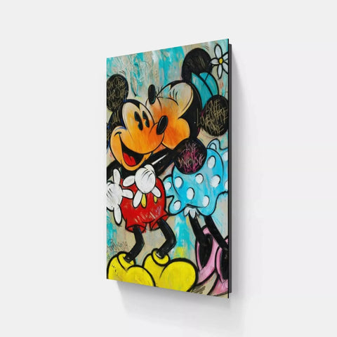 Mickey and minnie kissing on a wall with a blue background