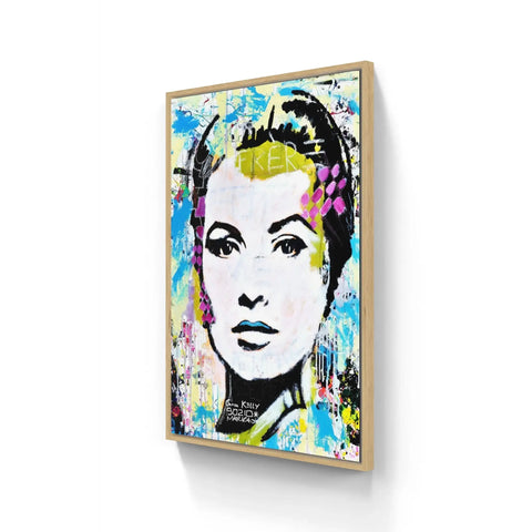 A painting of a woman’s face with colorful paint splats