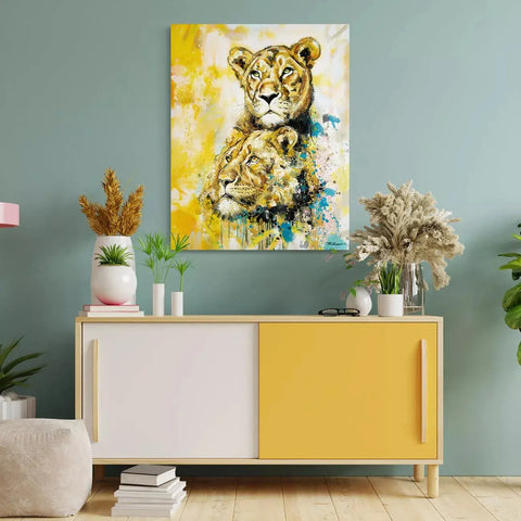 A close up of a painting of a lion and cub on a wall