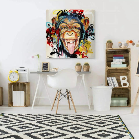 A painting of a monkey with a big smile on it’s face