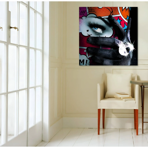 A chair in a room with a painting on the wall