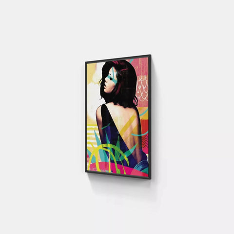 A framed print of a woman in a colorful dress