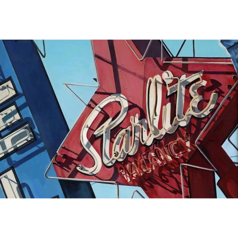 Vintage neon sign for ’Starlite’ in cursive lettering on a red star-shaped background.