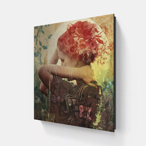 A woman with a flower in her hair canvas print