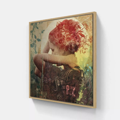 A framed print of a woman with flowers on her head