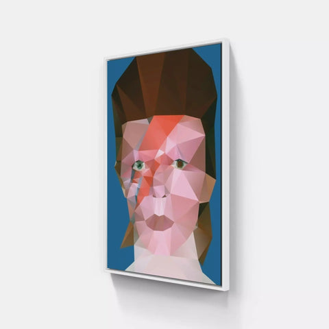 A pink and blue geometric face on a white wall